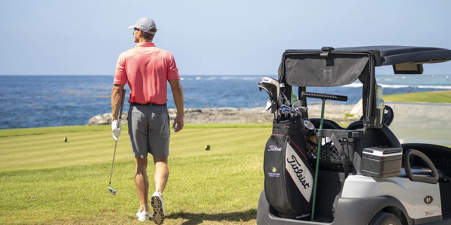 Golf cart and club bag at Corales Golf Course