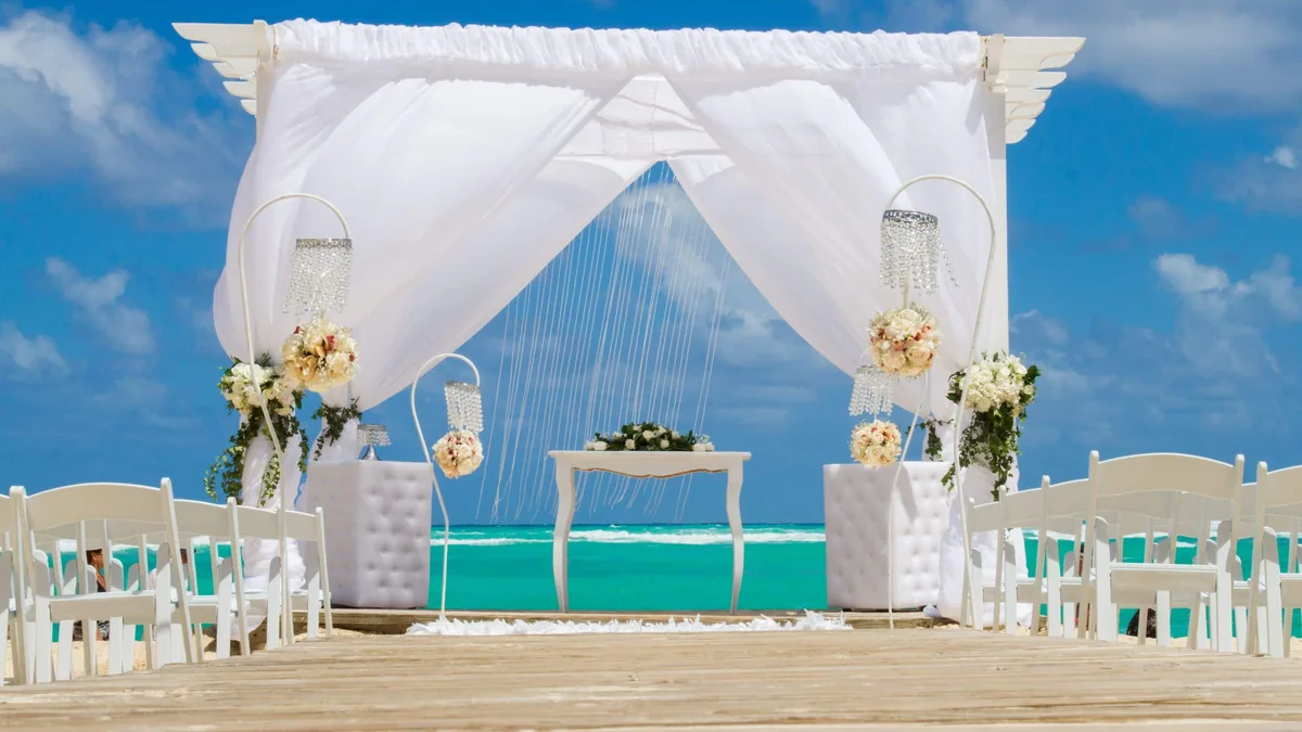 Wedding canopy and chairs overlooking the sea at Bahia Principe Escape Ambar