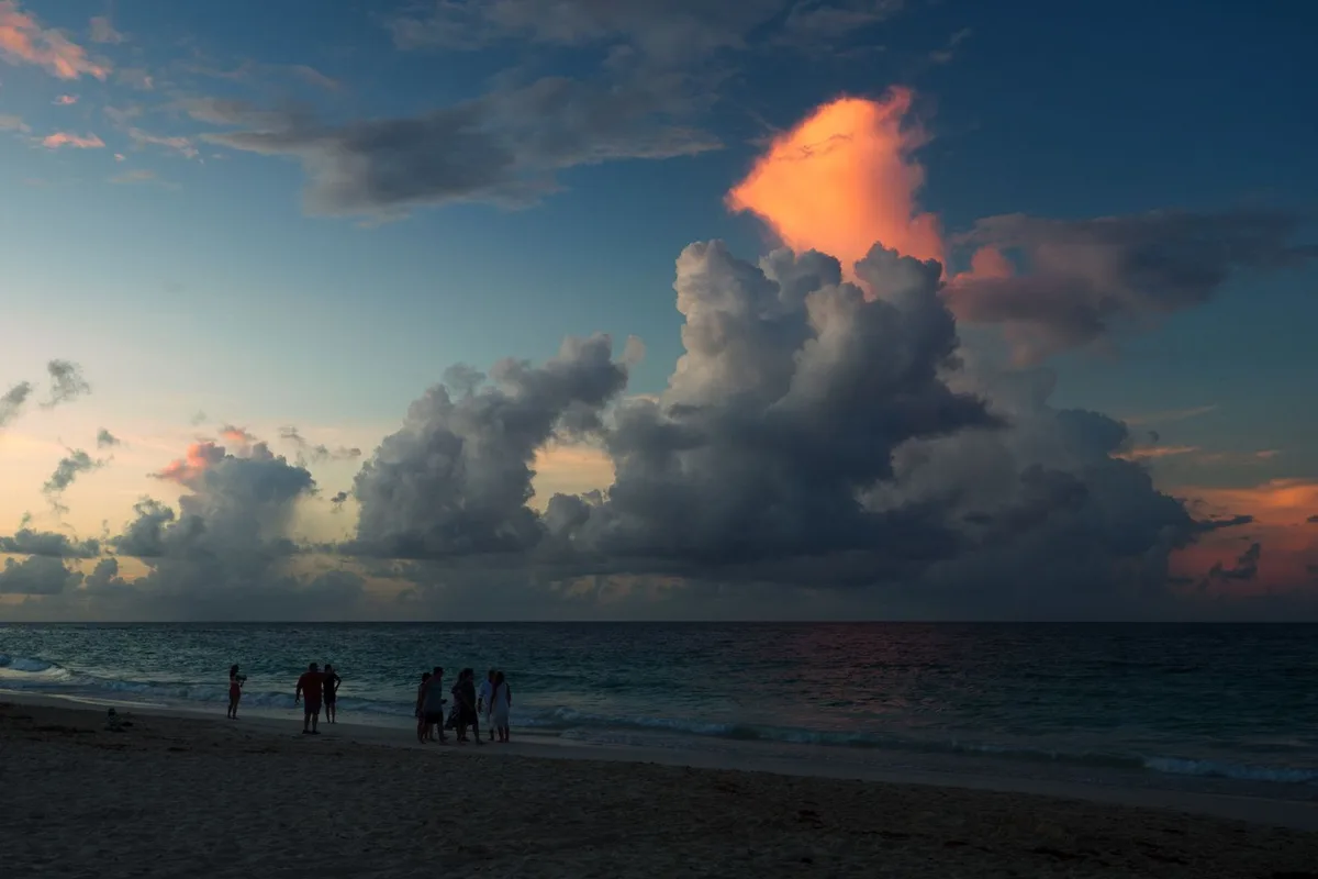 Punta Cana coast under a changing sky for travel-planning context