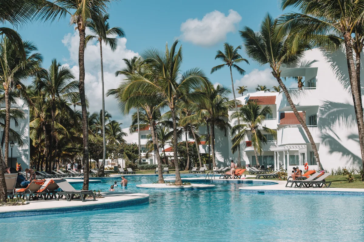Palm-framed pool at a Punta Cana resort