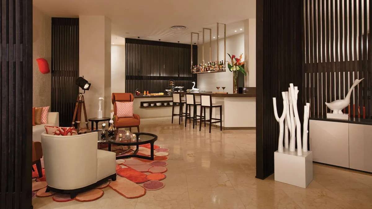 Preferred Club lounge by the lobby at Dreams Onyx Resort & Spa