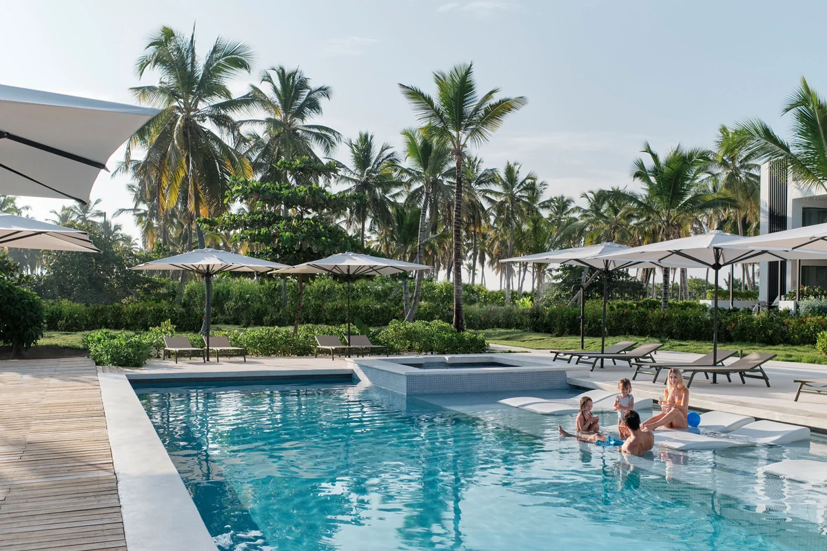 Family enjoying the pool at Finest Punta Cana