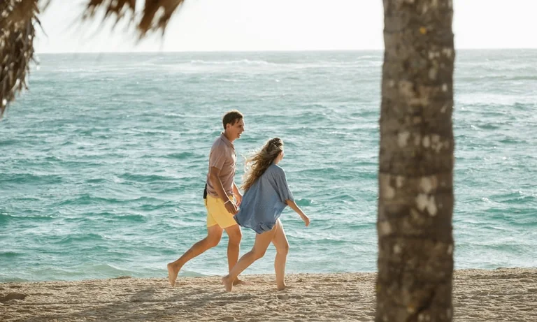 Guests walking along the beach at Iberostar Selection Bávaro Suites