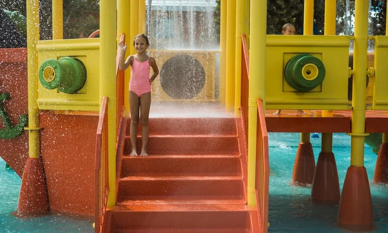 Child enjoying the playground at Iberostar Selection Bávaro Suites