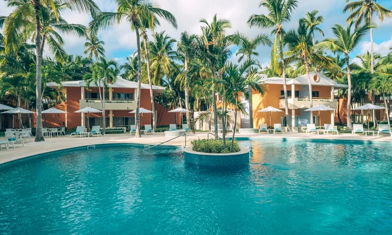 Palm-lined pool area at Iberostar Selection Bávaro Suites