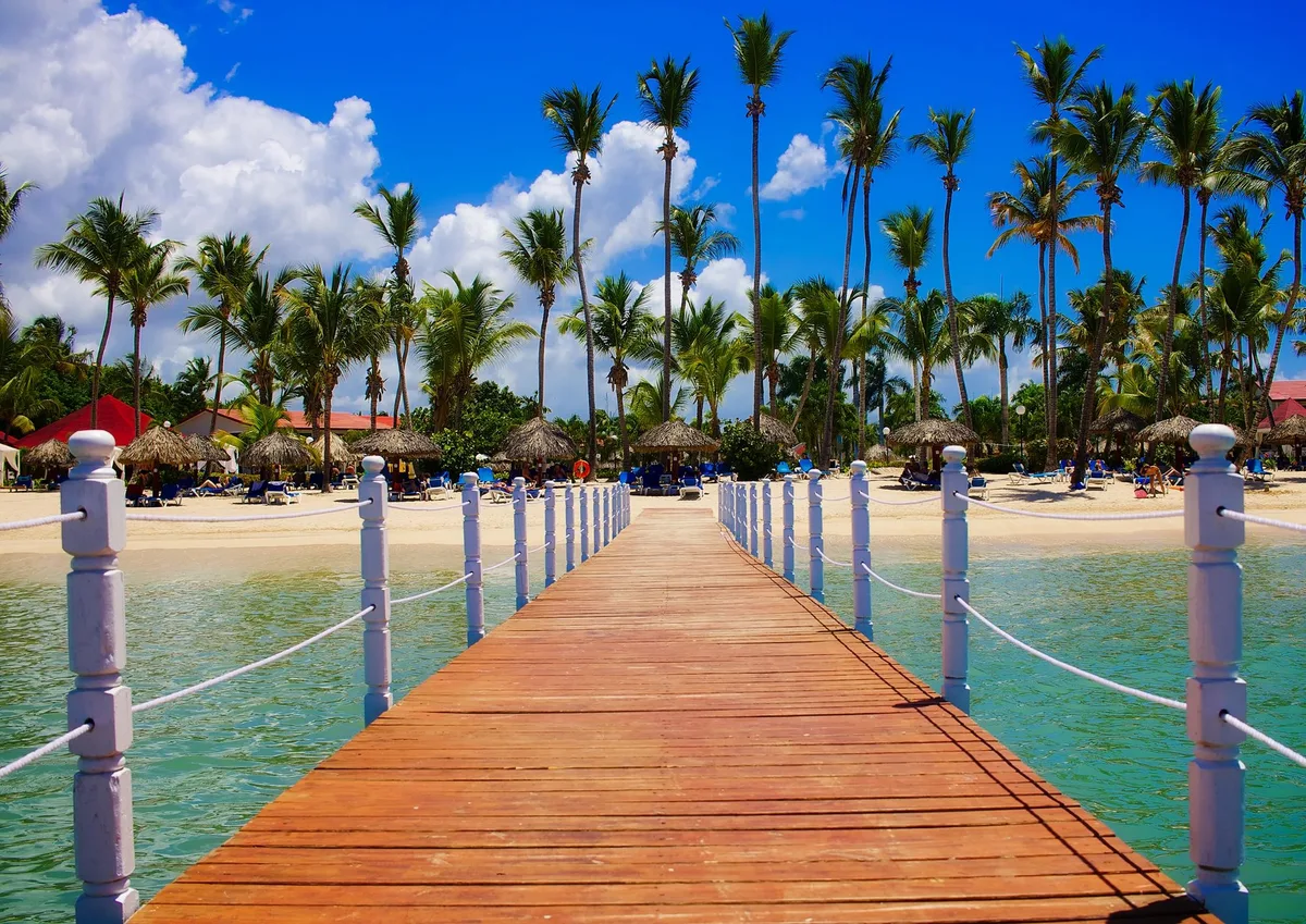Wooden dock and palms in a Punta Cana beach setting