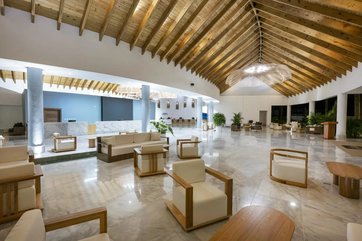 Seating beneath the timber roof in the Viva Miches lobby
