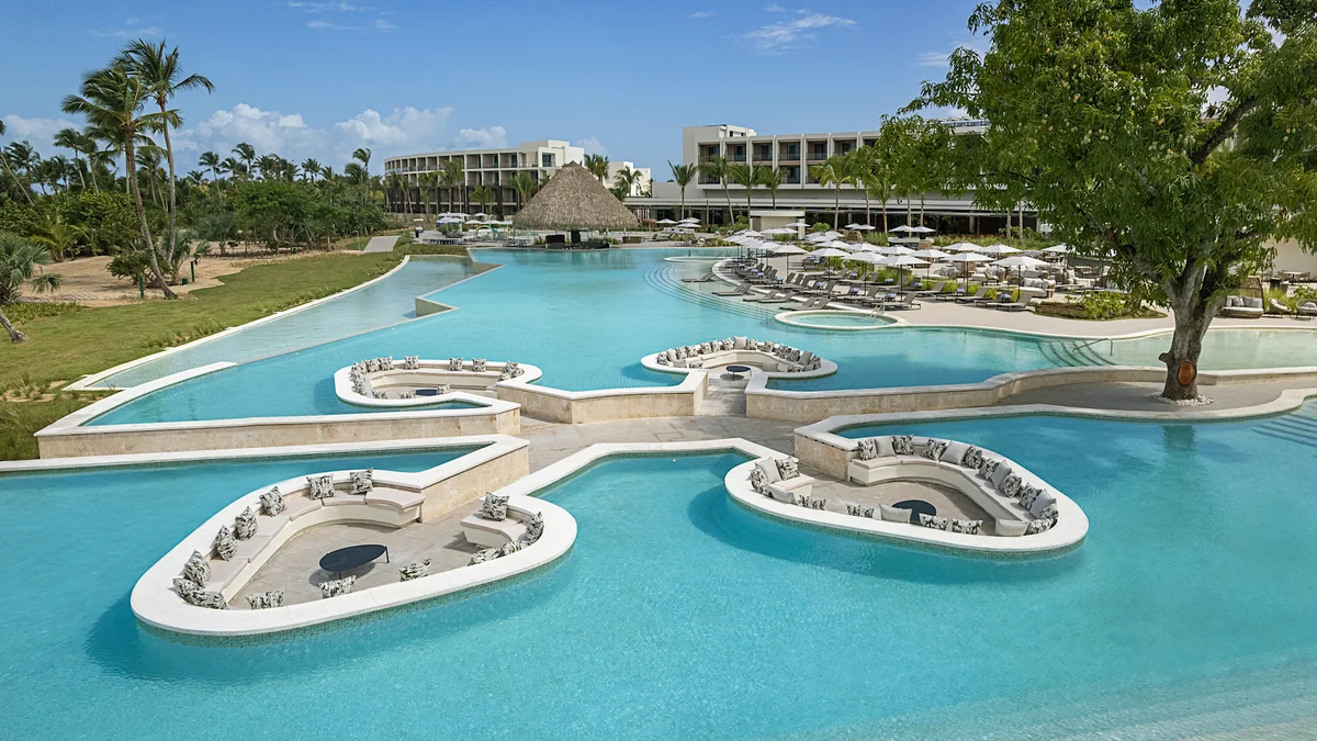 Sunken lounge seating in the main pool at Zemi Miches