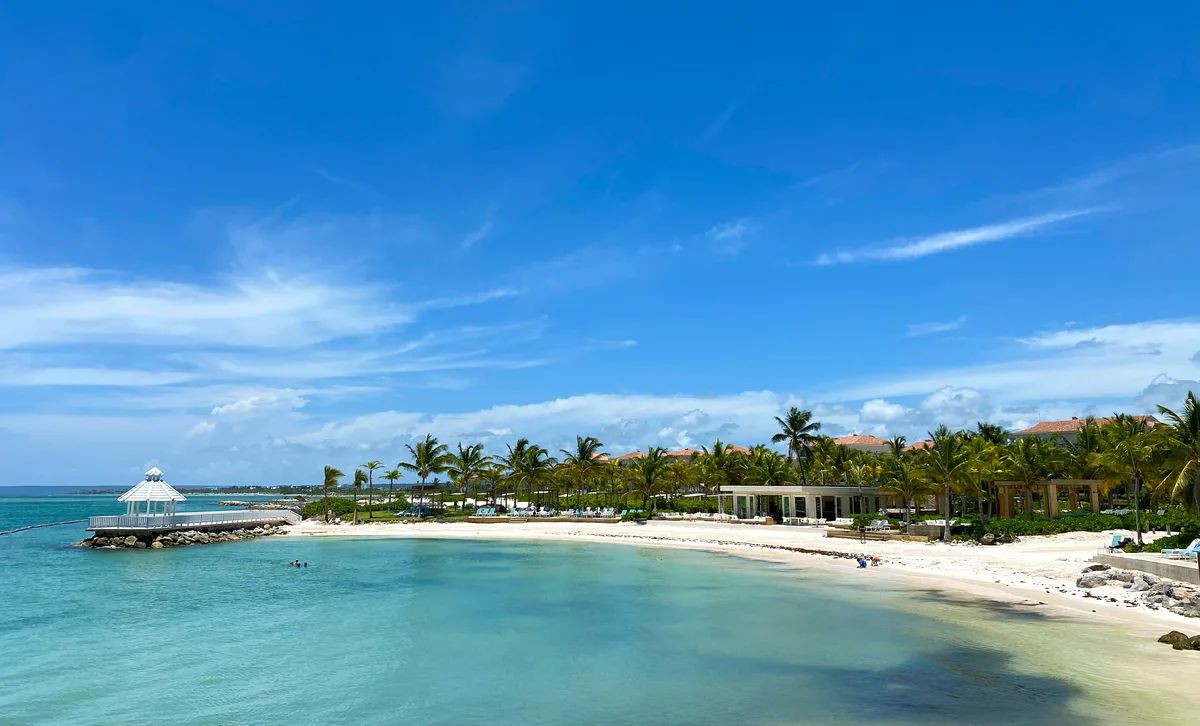 Palm-lined beach and blue water in Punta Cana