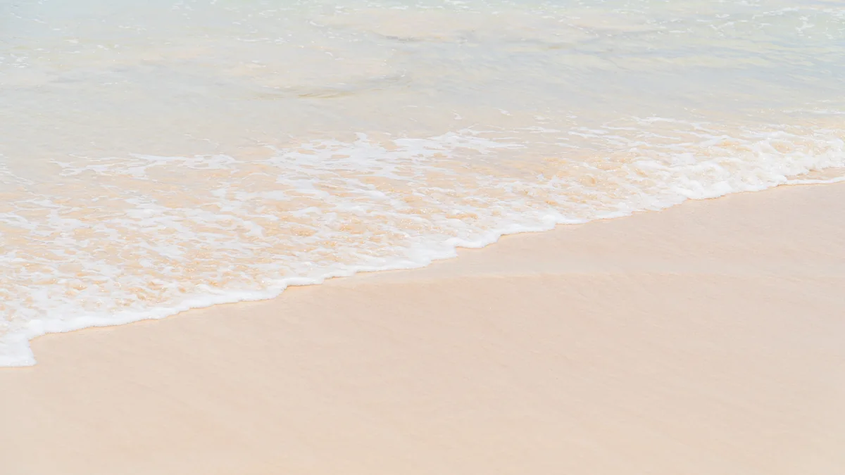 A wave washing onto the sand at Macao Beach