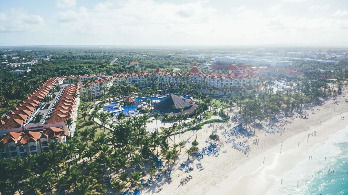 Aerial view of a beachfront resort on the wider Punta Cana hotel coast