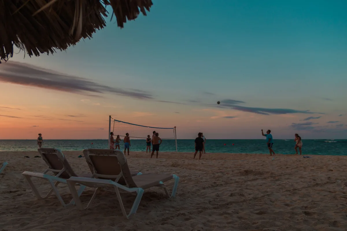 Beach volleyball at sunset in Punta Cana for itinerary-planning context