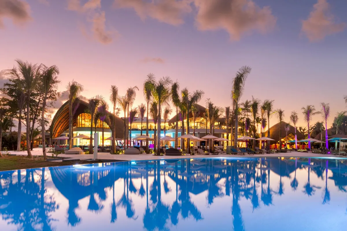 Pool and palm trees at Club Med Michès Playa Esmeralda